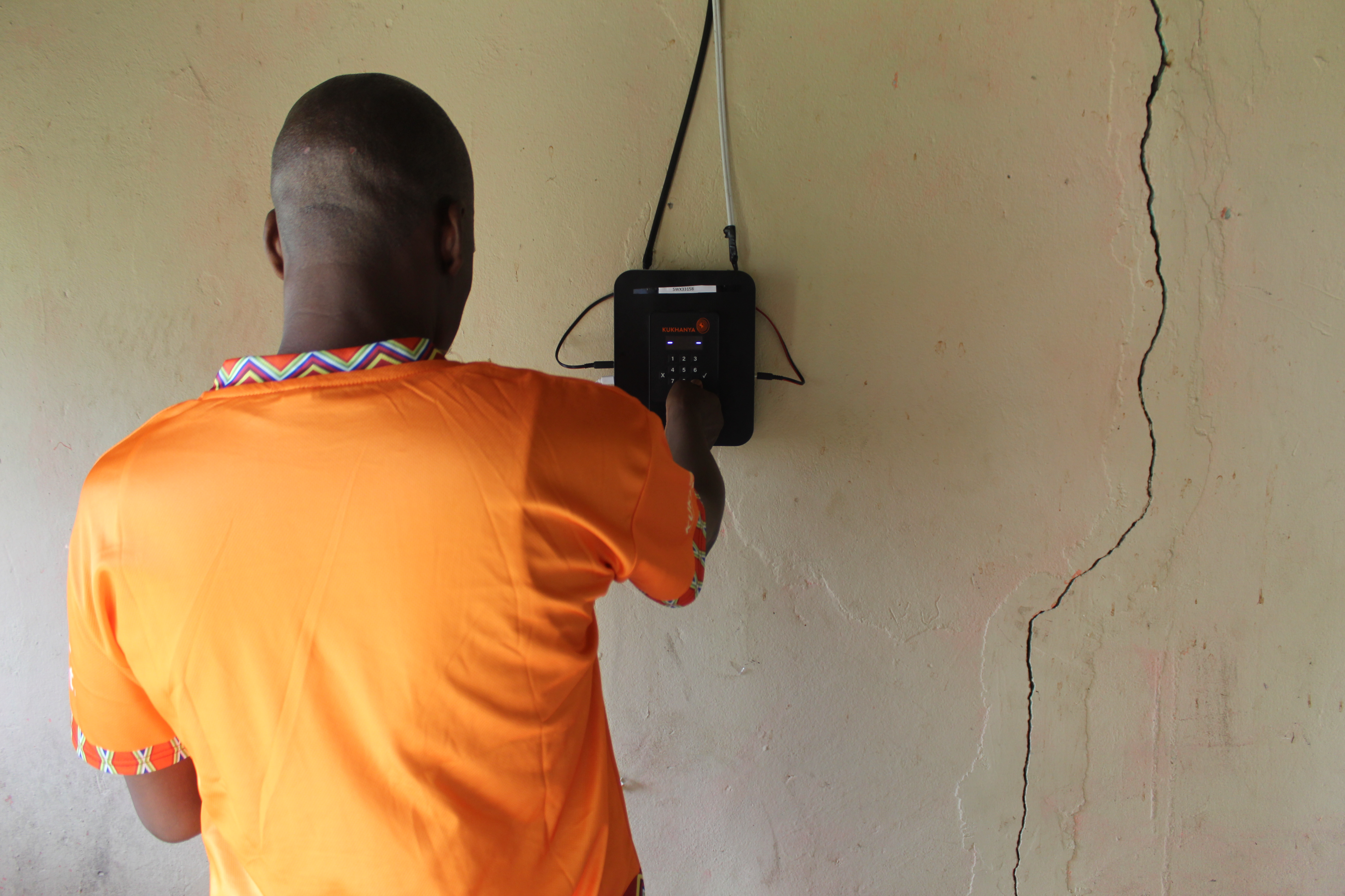 A mother and daughter using solar light at home